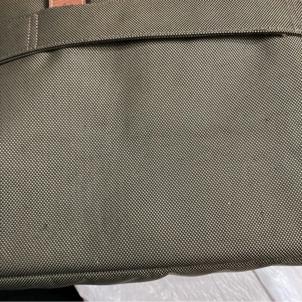 Longchamp canvas and leather duffle travel bag unisex